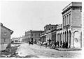 Looking north on Wharf street from Fort street, Victoria. 1866-1870.