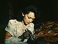 Image 56During World War II, a female aircraft worker checks electrical assemblies at the Vega Aircraft Corporation in Burbank, California.