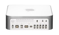 Back panel of a Late 2009 3,1 model Mac Mini. Ordered from left to right, top row: power button, ventilation holes, Kensington lock slot, audio in, audio out. Bottom row: DC in, gigabit Ethernet, FireWire 800, Mini DVI, Mini-DisplayPort, 5 USB 2.0 ports
