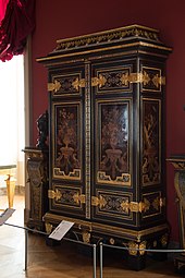 Cupboard; by André Charles Boulle; c.1700; ebony and amaranth veneering, polychrome woods, brass, tin, shell, and horn marquetry on an oak frame, gilt-bronze; 255.5 x 157.5 cm; Louvre[126]