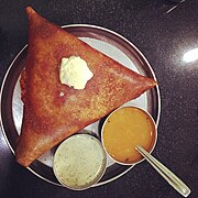 Butter dosa, known as benne dose in Karnataka. Predominantly famous as "Davanagere benne dose" associated with Davanagere district.