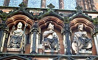 St Chad (left), alongside Mercian kings Peada and Wulfhere, as portrayed in 19th century sculpture above the western entrance to Lichfield Cathedral.
