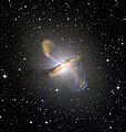 An image of the galaxy Centaurus A made by combining images from the MPG/ESO telescope, and the Chandra X-ray Observatory. It is the only known case of an "Elliptical Starburst" galaxy.