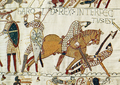 The death of King Harold, from the Bayeux Tapestry. The shields look heraldic, but do not seem to have been personal or hereditary emblems.