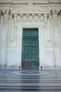 One of the massive neoclassical doors
