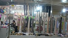 A display showing various stockings suspended on legs