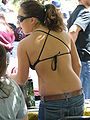 Image 92Woman wearing bikini top and jeans in USA, 2010. (from 2010s in fashion)