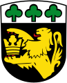 Gemeinde Karlskron Unter silbernem Schildhaupt, darin nebeneinander drei grüne Kleeblätter, in Schwarz ein wachsender, rot bewehrter goldener Löwe, der mit seinen Vorderpranken eine goldene Krone hält.