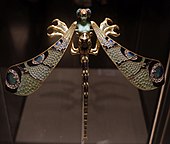 The Dragonfly brooch; by René Lalique; c. 1897–1898; gold, vitreous enamel, chrysoprase, chalcedony, moonstone and diamond; height: 23 centimetres (9.1 in), width: 26.5 centimetres (10.4 in); Calouste Gulbenkian Museum (Lisboa, Portugal)