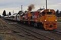 DFB 7241 and DXC 5270 departs Springfield with the TranzAlpine on 24 January 2016.