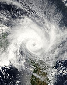 View of Cyclone Elita from Space on January 28, 2004. The eye of the storm, visible near the center of the image, is making landfall on Madagascar.