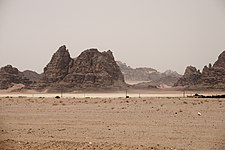 Wadi Rum rock formations along with Bedouin camps