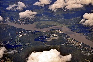 Aerial view of West Point (at the center), the Hudson River, Highland Falls (on right), Cold Spring (on left) across the river in Putnam County
