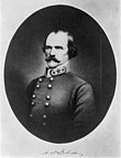 Confederate Civil War general with mustache and hair covering his ears