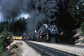 UP Nos. 844 (as UP 8444) and 3985 running through Donner Pass in April 1981