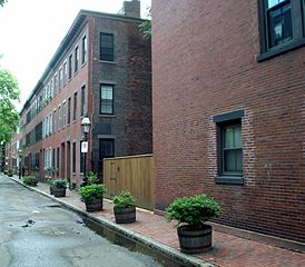 Flat, red-brick buildings