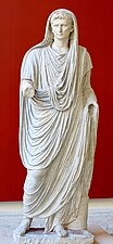 Augustus (63 BC–14 AD) wearing a toga and calcei patricii (shoes reserved for Patricians), a capsa (container for documents) lies at his feet – late 1st century AD – Museo Nazionale Romano Rome