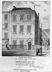 Engraving of a three-storey building, seen from the street. Women in long dresses date the picture.