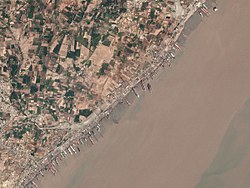 Ships beached at Alang for scrapping, satellite view, 17 March 2017