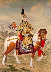 The Qing dynasty Qianlong Emperor in ceremonial armour on horseback