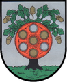 Das Wappen der Gemeinde Holle zeigt eine Scheibenfibel.