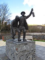 bronze sculpture of two miners