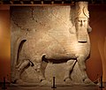 Initially depicted as a goddess in Sumerian times, when it was called Lamma, it was later depicted from Assyrian times as hybrid of a human, bird, and either a bull or lion under the name Lamassu. It appears frequently in Mesopotamian art and Iraqi art.[24]