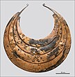 Bronze collar with sun ship motifs.[11]