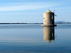 The windmill on the lagoon of Orbetello.