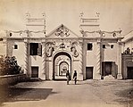 Samuel Bourne, "The Mermaid Gate, Kaiser Bagh. Lucknow, 1041," 1863–1869, photograph mounted on cardboard sheet