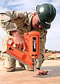 Combustible fuel and an electric igniter power many "cordless" nail guns