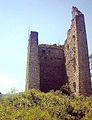Bergfried of a ministerial castle in the Bishopric of Kempten: the two-part, residential main tower of Vilsegg Castle, Tyrol, Austria. The beam holes show where the former floors were