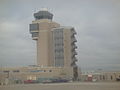 Arrival at Minneapolis-St. Paul International Airport (ICAO: KMSP; IATA: MSP) to change flights; viewed here is the air traffic control tower.