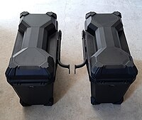 These panniers for a Kawasaki Versys have been detached from the motorcycle