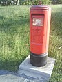 A post box in Barbados featuring the royal cypher of Queen Elizabeth II