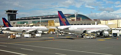 Two Airbus A320 aircraft from TACA Airlines at the Juan Santamaría International Airport.