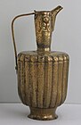 Islamic ewer, probably Iranian, late 12th–13th century, brass, fluted, engraved and repoussé, originally inlaid with silver, Metropolitan Museum of Art