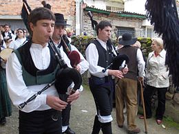 Gaiteiros, or bagpipe players. Gaita ('bagpipe') is the most representative Galician musical instrument