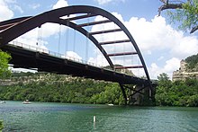 image of Pennybacker Bridge from underneath on Lake Austin