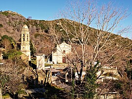 The church of San Mamilianu and the surrounding buildings, in Scolca