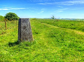 Trig Point on Kithurst Hill West Sussex. Located on the South Downs Way above the village of Storrington. 699 ft high at the summit.