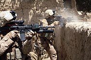 Marines from 2/8 firing on an enemy position in Garmsir, July 3, 2009