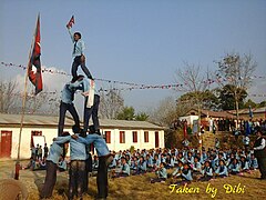 People holding Flag of Nepal