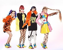 Each group member posing in a photoshoot