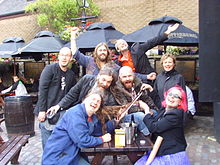 The A Band at the Edinburgh Fringe Festival, 2009. Back row: Pete Herring, Karl Waugh, Stewart Greenwood. Middle:Stewart Keith, Seth Cooke, Gardyloo SPeW. Front: Andrew Fletcher, Greta Pistaceci.