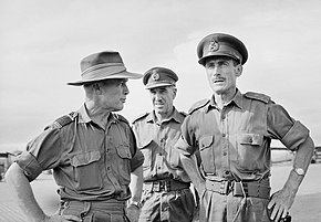 Informal portrait of three men in military uniforms