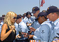 Image 12Playmate of the Year and People for the Ethical Treatment of Animals spokesperson Pamela Anderson, signing DVDs at the USS Halsey