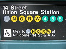 A sign at the entrance to the station. It contains the text "14 Street Union Square Station", the emblems for the routes that stop there, and elevator information.