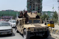 Image 39Taliban fighters patrolling Kabul in a Humvee, 17 August 2021 (from History of Afghanistan)