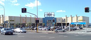 The front top parking lot at Glenfield Mall. Most of the parking, and most of the mall itself, is behind and below on further levels. (Photo taken prior to overhaul in the mid-2010s)